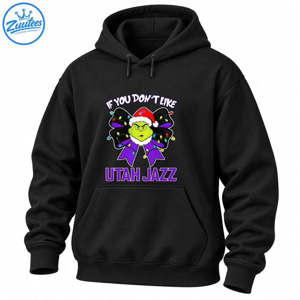 Grumpy green holiday character in a Santa hat on a purple bow with colorful Christmas lights and Utah Jazz lettering Grumpy green holiday character in a Santa hat on a purple bow with colorful Christmas lights and Utah Jazz lettering