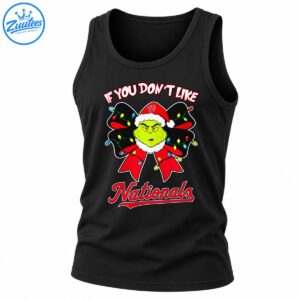 Grumpy green Christmas character in a Santa hat with a red bow, colorful lights, and Nationals lettering