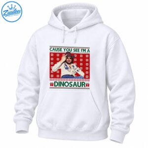 Retro Christmas graphic featuring a bearded cowboy in sunglasses, red snowflakes, green lettering, and dinosaur text