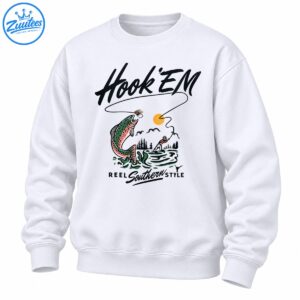 Vintage fishing design with a leaping spotted trout, golden sun, looping fishing line, green water, angler, and Hook 'Em Reel Southern Style lettering.
