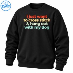 Colorful cross stitch and dog lover shirt design with coral, cream, pale green, and aqua lettering