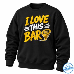 I Love This Bar shirt design with golden-yellow lettering, white accents, and a yellow-and-black tornado graphic