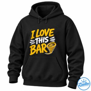 I Love This Bar shirt design with golden-yellow lettering, white accents, and a yellow-and-black tornado graphic
