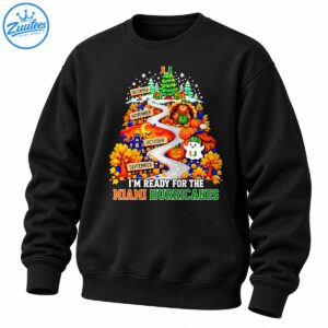 Miami Hurricanes fall shirt with a winding seasonal road, autumn leaves, pumpkins, a turkey, a ghost, and a Christmas tree