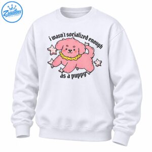 Pink fluffy cartoon puppy with a yellow ruffled collar, star accents, and black text reading I wasn't socialized enough as a puppy.