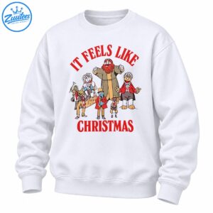 It Feels Like Christmas shirt design with red vintage lettering and a cheerful group of colorful holiday characters