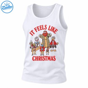 It Feels Like Christmas shirt design with red vintage lettering and a cheerful group of colorful holiday characters