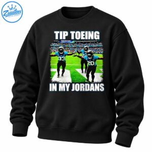 Football celebration graphic with teal and black uniformed players, stadium crowd, and bold Tip Toeing In My Jordans text