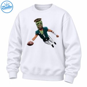 Green jalapeño-headed football player wearing a teal number 1 jersey and white pants while leaping with a brown football