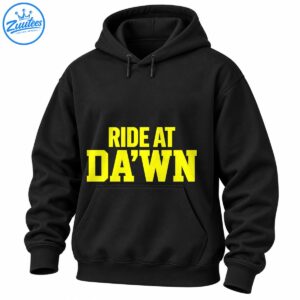 Bright yellow RIDE AT DA’WN collegiate lettering in two lines on a dark background