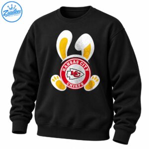 Distressed Easter bunny design with white ears, golden-yellow paws, and a red circular Kansas City Chiefs arrowhead emblem.