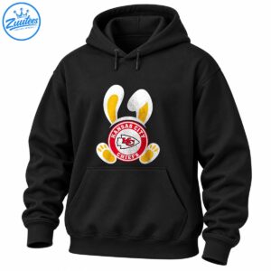 Distressed Easter bunny design with white ears, golden-yellow paws, and a red circular Kansas City Chiefs arrowhead emblem.