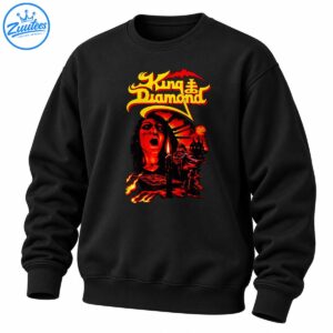 King Diamond gothic metal artwork with yellow lettering, a screaming face, candle, cloaked figures, castle, and fiery red-orange scenery