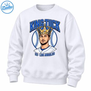 King Tuck baseball shirt design featuring a crowned player portrait, blue varsity lettering, a baseball, and 23 Los Angeles text