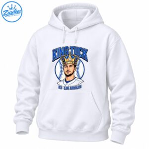 King Tuck baseball shirt design featuring a crowned player portrait, blue varsity lettering, a baseball, and 23 Los Angeles text