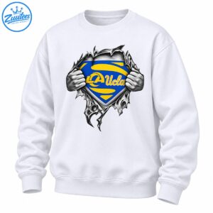 Blue and gold LA Ucla shield revealed by grayscale hands ripping through jagged material