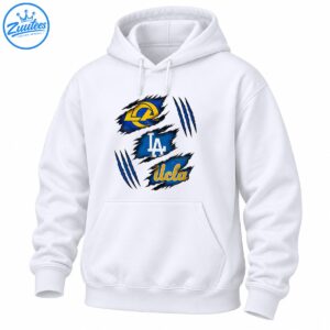 Three blue torn-fabric patches with gold ram emblem, white LA lettering, gold Ucla script, and blue claw marks