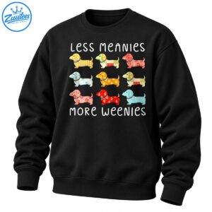 Less Meanies More Weenies shirt design with white lettering and nine colorful patchwork dachshund dogs.