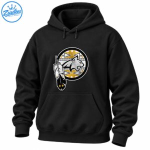 Circular silver-gray cougar emblem with distressed gold and white geometric patterns and decorative feathers on a black shirt.