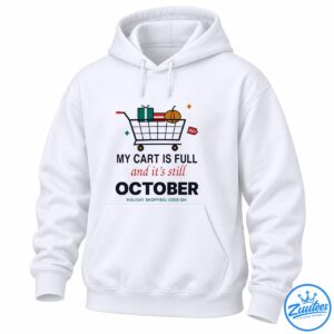 Funny October shopping shirt design with a full cart, wrapped presents, pumpkin, sale tag, and holiday shopping text.