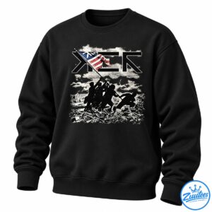 Distressed vintage graphic with bold black lettering, a waving American flag, and soldier silhouettes amid smoky ruins.