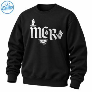 Distressed white gothic lettering with a candle, symbolic open hand, and semicircular sunburst graphic on a dark shirt