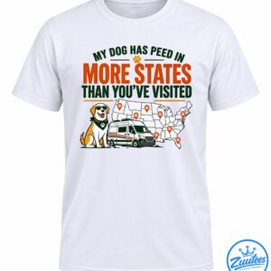 Funny dog travel shirt design with a sunglasses-wearing dog, travel van, US map, paw print markers, and bold orange and green text.