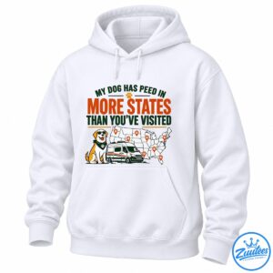 Funny dog travel shirt design with a sunglasses-wearing dog, travel van, US map, paw print markers, and bold orange and green text.