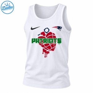 Red dripping grenade-like graphic with distressed green PATRIOTS lettering and navy and red sports-inspired emblems on a shirt.