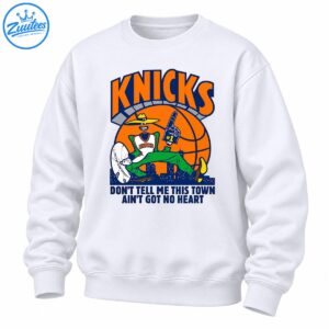 Knicks mascot shirt design with orange lettering, a cartoon in green pants, a basketball, city skyline, and slogan