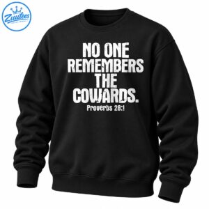 Proverbs 28:1 shirt with distressed white text reading No One Remembers the Cowards in bold vintage typography
