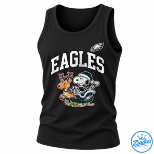 Snoopy in a teal winter outfit rides a sleigh with a red-nosed reindeer beneath bold white EAGLES lettering and an eagle emblem.