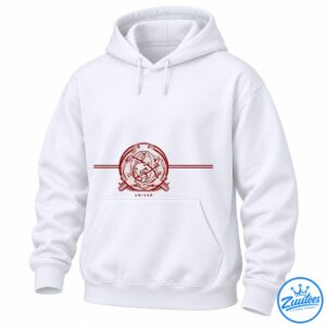 Distressed red circular celestial emblem with stars, intersecting lines, crossed details, and small lettering on a dark background