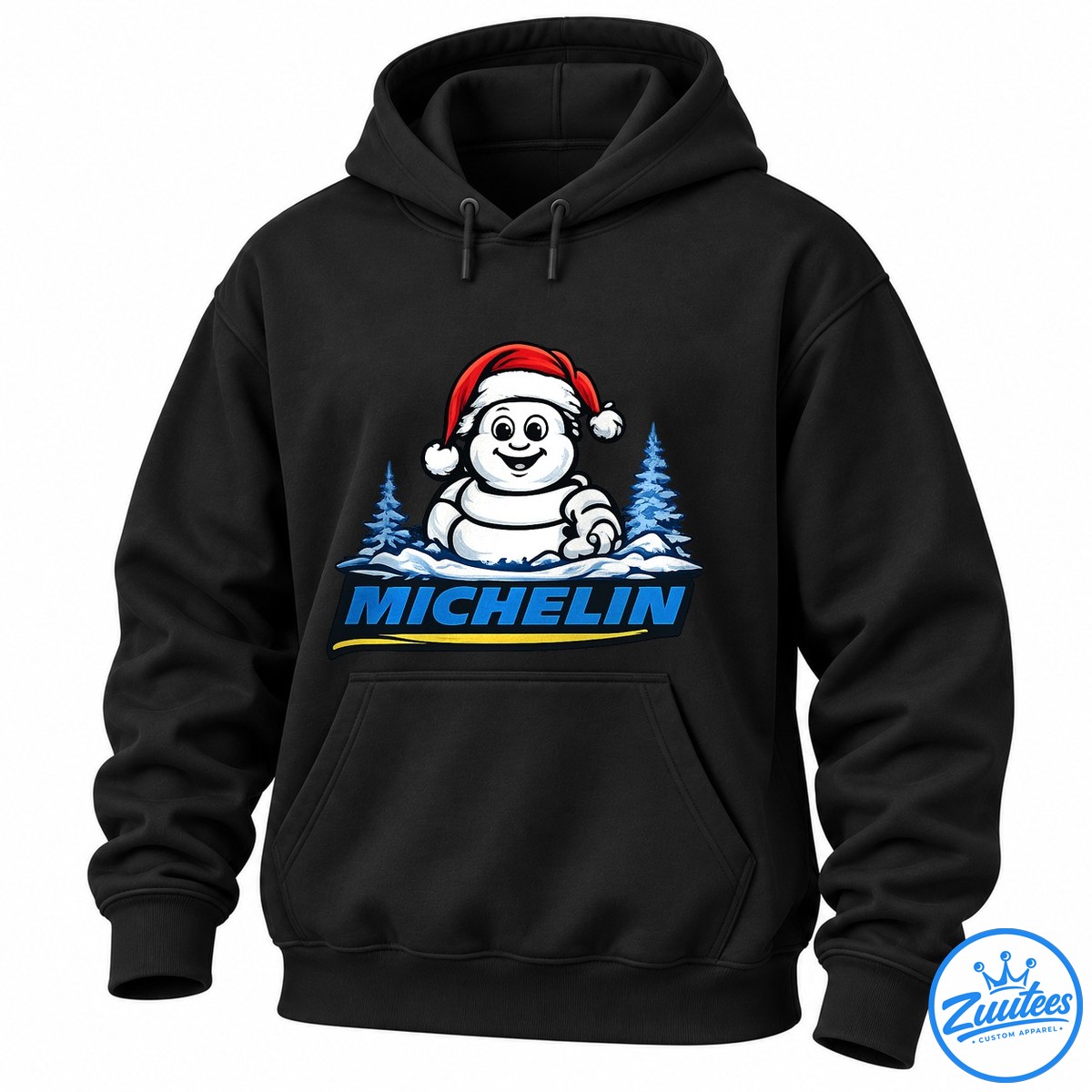 Rat Fink X Michelin More Miles Brighter Holidays Shirt Cartoon snowman wearing a red Santa hat above blue MICHELIN lettering, with snowy pine trees and a yellow underline.