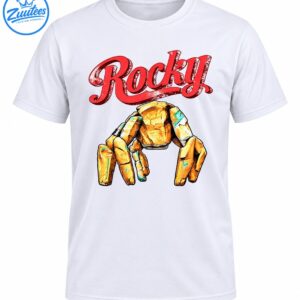 Rocky distressed red script above a golden-orange stone creature with turquoise accents and rugged outlines