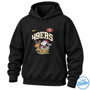 49ers Snoopy shirt design with Snoopy in a Santa suit riding a gold sleigh pulled by a reindeer.
