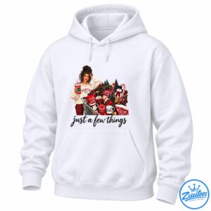 Santa Baby Christmas shopping shirt design with a woman, shopping cart, wrapped gifts, nutcracker, snowman, reindeer, and festive decorations.