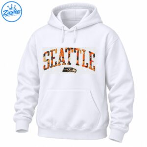 Seattle wordmark in distressed orange, black, and cream lettering above a vintage-style hawk head graphic