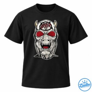 Slayer red lettering on a distressed black and white horned monster face with red eyes, fangs, and gold horns.