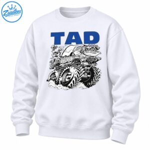TAD vintage monster truck design with bold blue lettering, giant treaded tires, and detailed black and white grunge artwork
