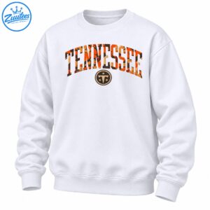 Tennessee wordmark shirt design with distressed orange camouflage varsity lettering and a circular three-star T emblem
