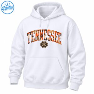 Tennessee wordmark shirt design with distressed orange camouflage varsity lettering and a circular three-star T emblem