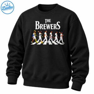 The Brewers baseball graphic with six uniformed players walking across a striped crosswalk beneath white serif lettering