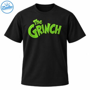Bold fuzzy green The Grinch lettering graphic with playful cartoon-style text on a dark shirt