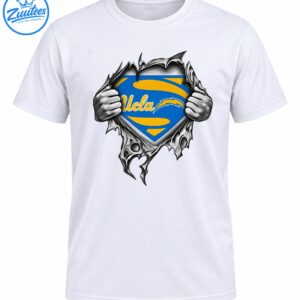 UCLA blue and gold shield with cursive lettering revealed by grayscale hands ripping through jagged material