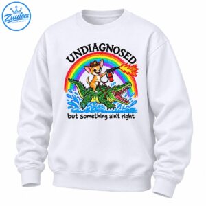 Funny Chihuahua cowboy riding a green alligator under a rainbow with the text Undiagnosed But Something Ain't Right