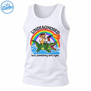Funny Chihuahua cowboy riding a green alligator under a rainbow with the text Undiagnosed But Something Ain't Right