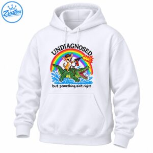 Funny Chihuahua cowboy riding a green alligator under a rainbow with the text Undiagnosed But Something Ain't Right