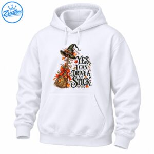 Yes I Can Drive A Stick Halloween shirt design with witch hat, rustic broom, orange bow, fall leaves and vintage lettering